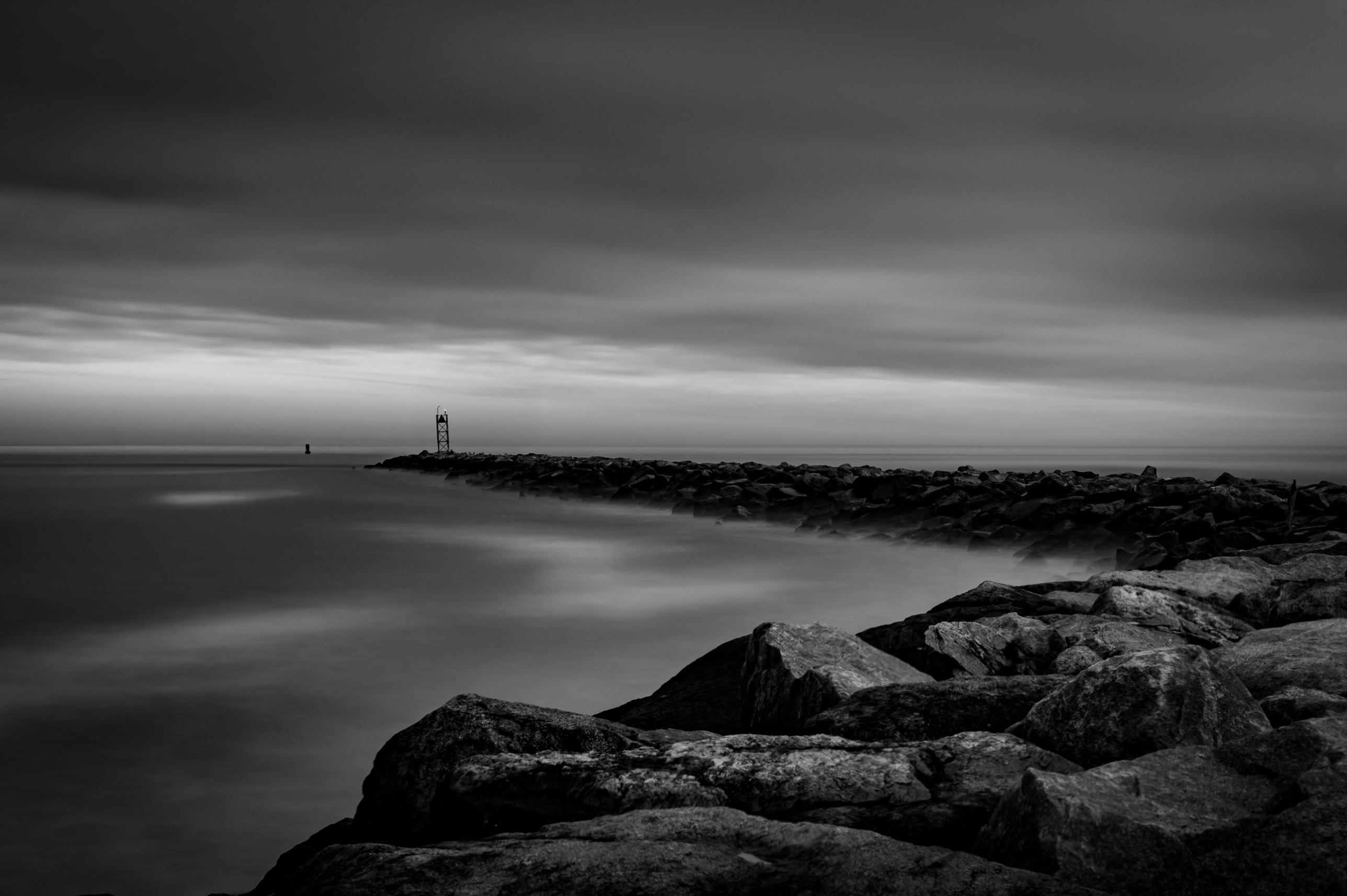 Black and white long exposure of the jetty at Hampton Beach State Park, New Hampshire